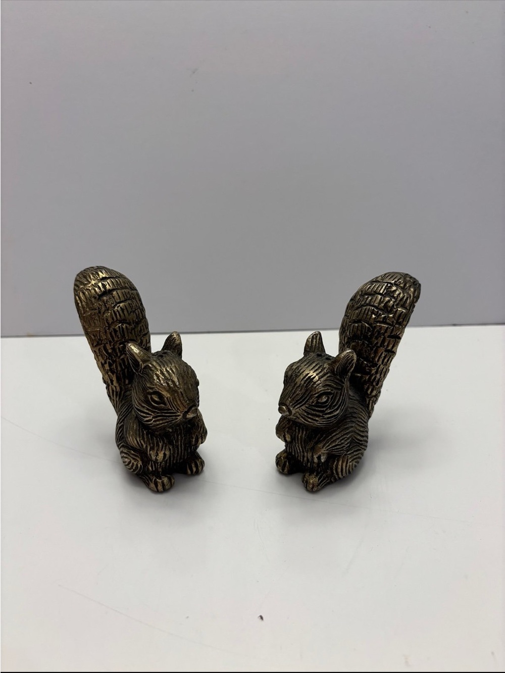 Vintage pair of brass squirrel salt & pepper shakers